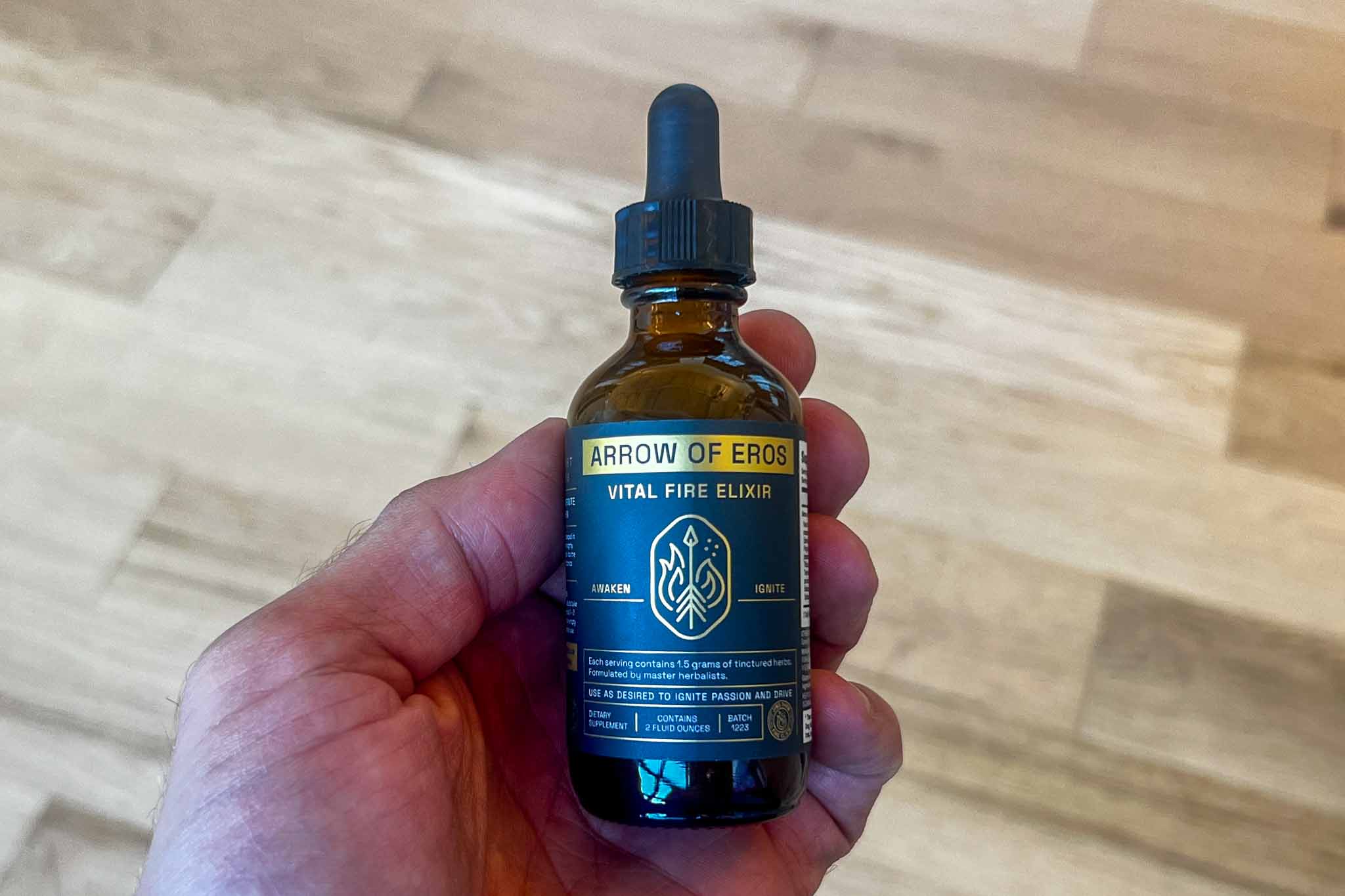 Holding a Bottle of Pure Eros